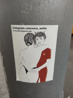 Street sticker A sticker featuring a line drawing of a couple embracing. The style is minimalist and slightly suggestive. The man has small horns drawn on his head. The sticker includes the artist's Instagram and email address.