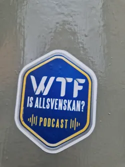 A blue and yellow hexagonal sticker with the text "WTF IS ALLSVENSKAN?" and "Podcast" in the center. 
