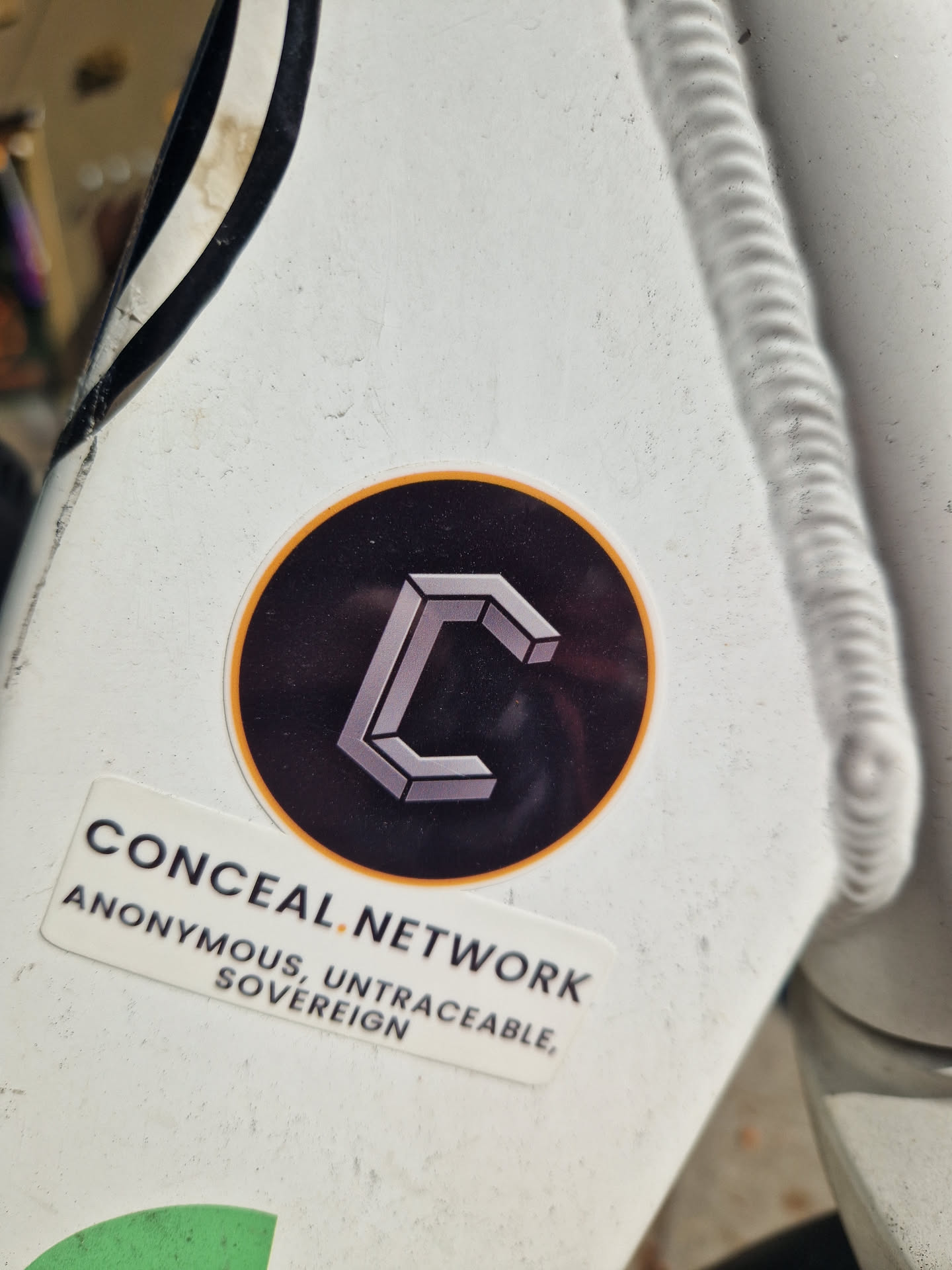 The sticker features the logo of Conceal Network, which is a stylized 'C' within a black circle with an orange border. Below the logo, the text 'CONCEAL.NETWORK ANONYMOUS, UNTRACEABLE, SOVEREIGN' is printed on a white rectangle sticker.
