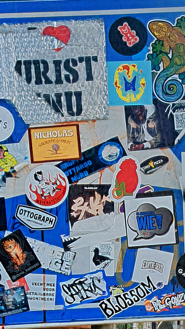 This image features a collection of various stickers affixed to what appears to be a blue wall or surface. The stickers vary in size, shape, and design, including logos, text, and illustrations. Some stickers include text like 'TOURIST', 'NICHOLAS GROENTJ 6P PRUTT', 'GRUPP OTTARDO NORD', 'TONO PIZZA amsterdam', 'OTTOGRAPH AMSTERDAM', 'WIE', 'EXOTIC-SEED', 'BLOSSOM', and others. Some stickers feature illustrations such as stylized characters, animals, or abstract designs. The arrangement is cluttered, creating a collage effect that suggests an accumulation of personal expression or local advertising.