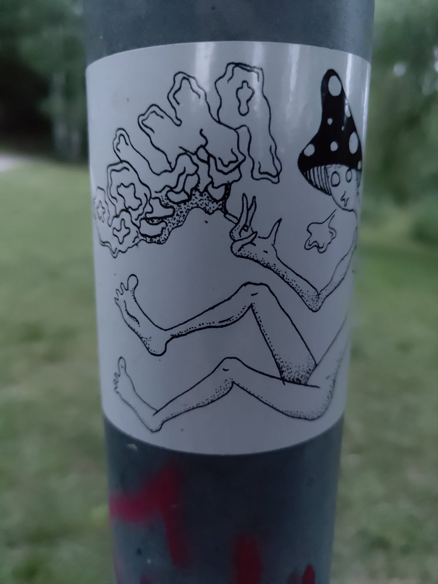 A black and white illustration of a whimsical creature, possibly a mushroom person, lounging and enjoying what seems to be smoke. The style is simplistic and slightly psychedelic.
