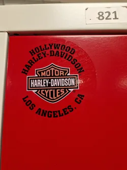 Round sticker featuring the Harley Davidson logo and text. The text says 'Hollywood Harley-Davidson Los Angeles, CA'.