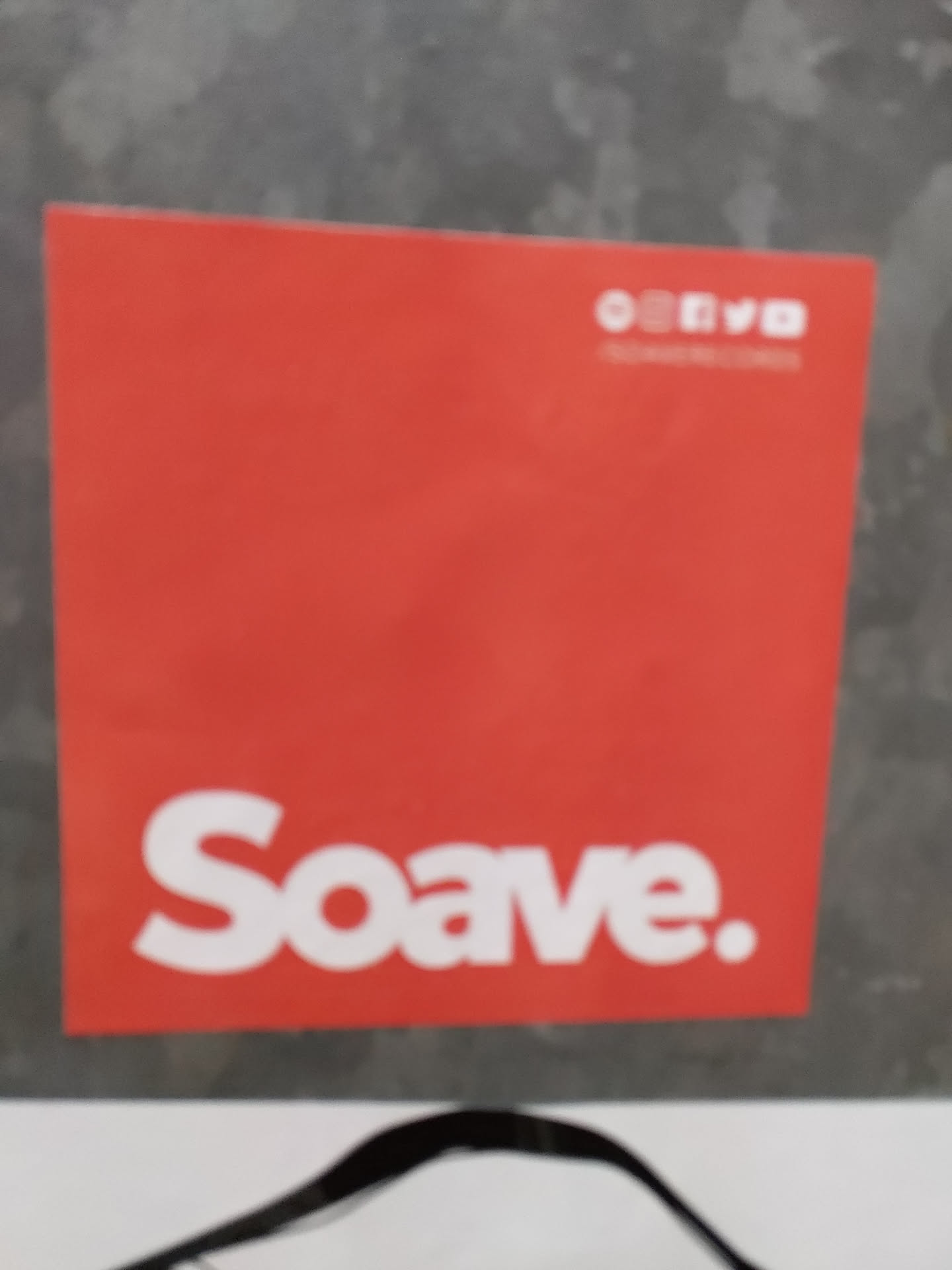 A red sticker with the word Soave. in white and the text "Automated Solutions" in small print at the top. 