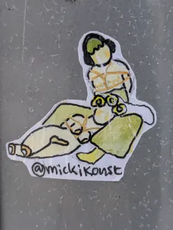 A small sticker with an illustration of a person tied up, drawn in a simple, watercolor-like style. The artwork is lighthearted, with muted colors and simple lines. The sticker includes the artist's Instagram handle.