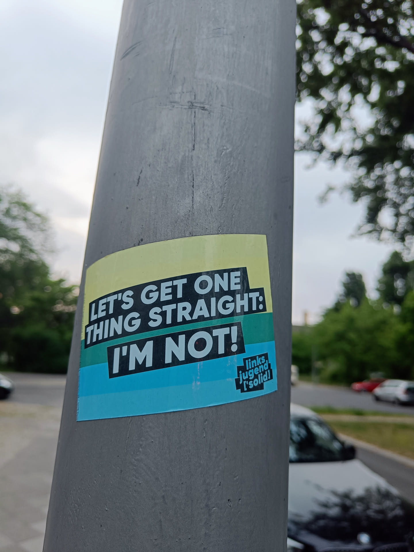 A sticker expressing non-heterosexual identity. It features a playful, bold statement with a colorful design. The sticker also displays the 'Links, Jugend ['solid]' logo, indicating potential affiliation with a youth organization.