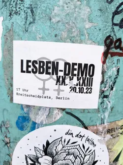 A sticker announcing a lesbian demonstration in Breitscheidplatz, Berlin on October 20th, 2023 at 5 PM.