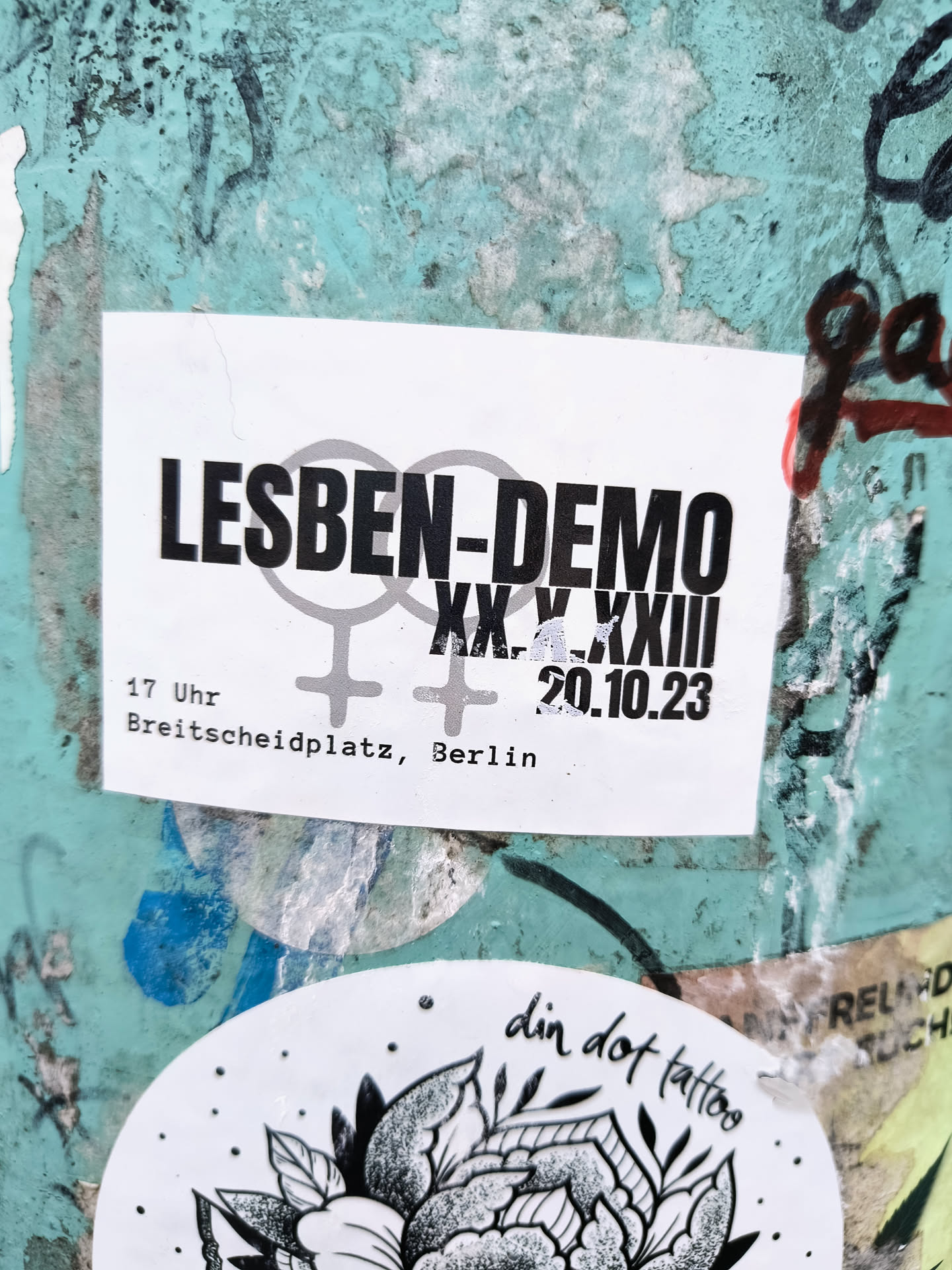 A sticker announcing a lesbian demonstration in Breitscheidplatz, Berlin on October 20th, 2023 at 5 PM.