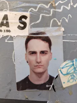 The sticker features a person with short dark hair, dark eyes, and a nose ring. The person is wearing a black shirt. The sticker has the Instagram handle "@jule" printed at the bottom.