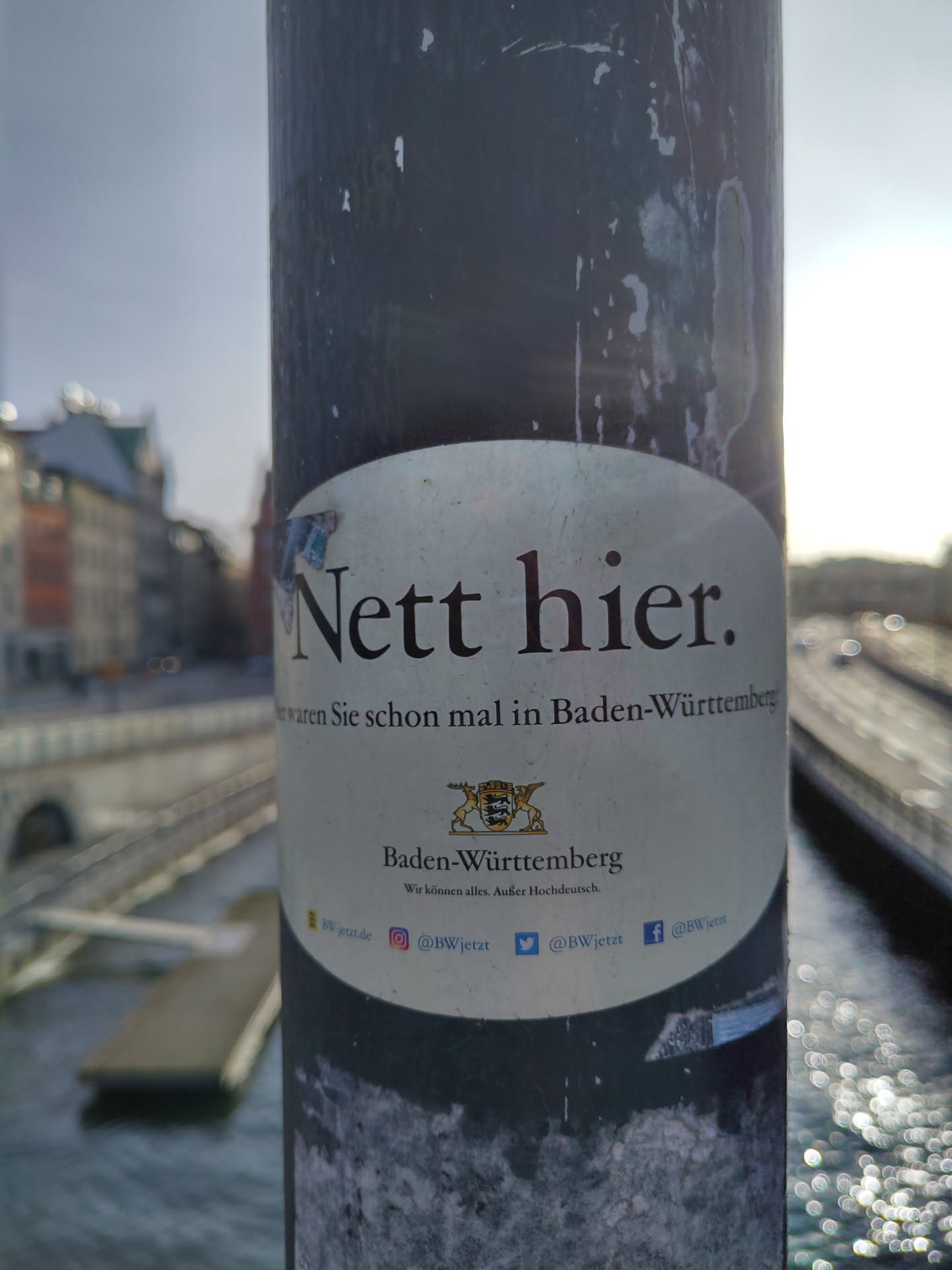 Sticker promoting tourism in Baden-Württemberg, Germany. It features the coat of arms of the state and social media links.