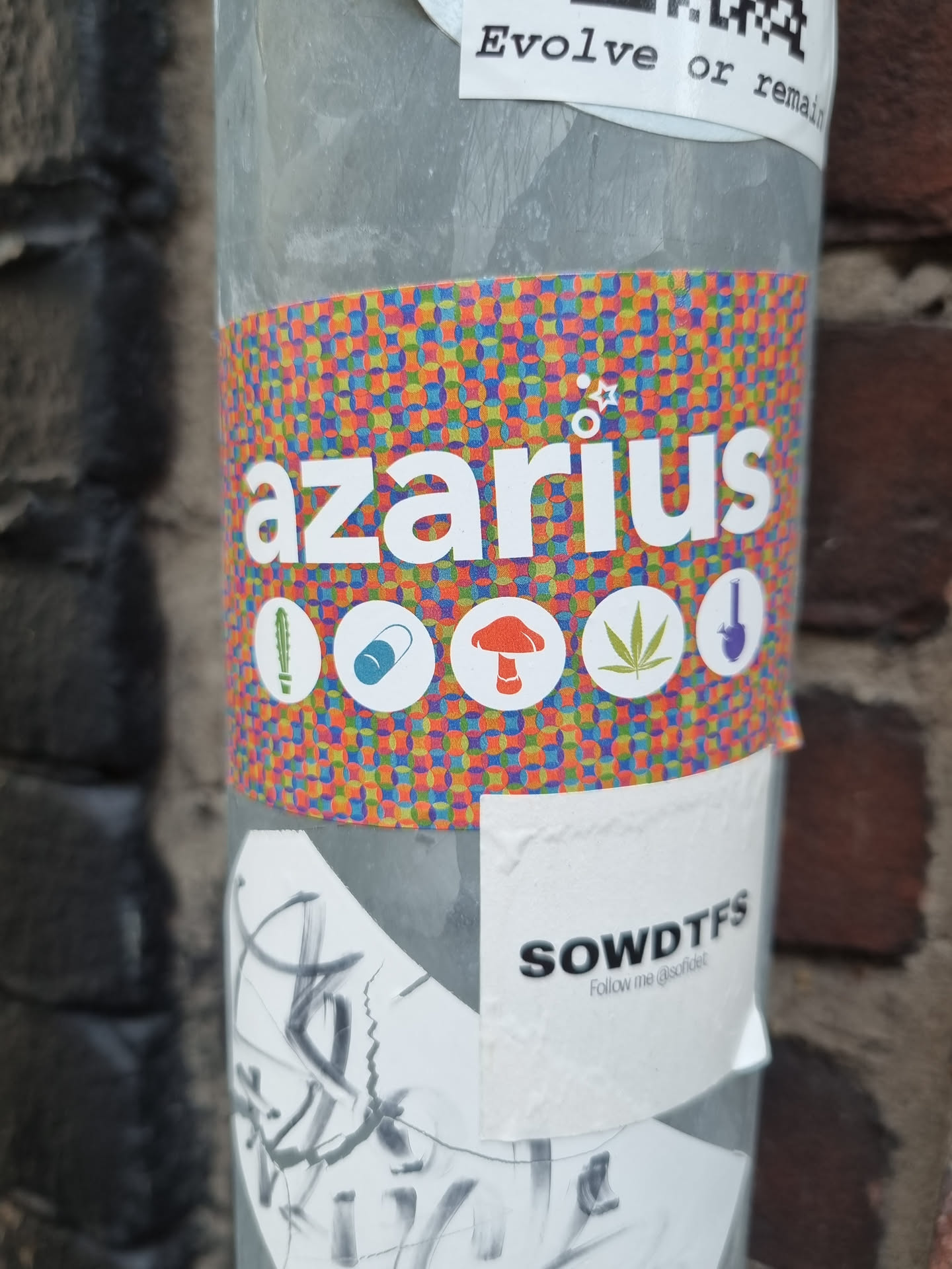 Colorful sticker with the word azarius and various icons. Below is another sticker that says "Sowdtfs Follow the guide"