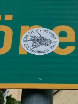 Round white sticker with a black and grey illustration of a dragon-like claw. The text around the image reads: "BERLIN - EST. 2018 - WWCD - FULLY AUTHORIZED"
