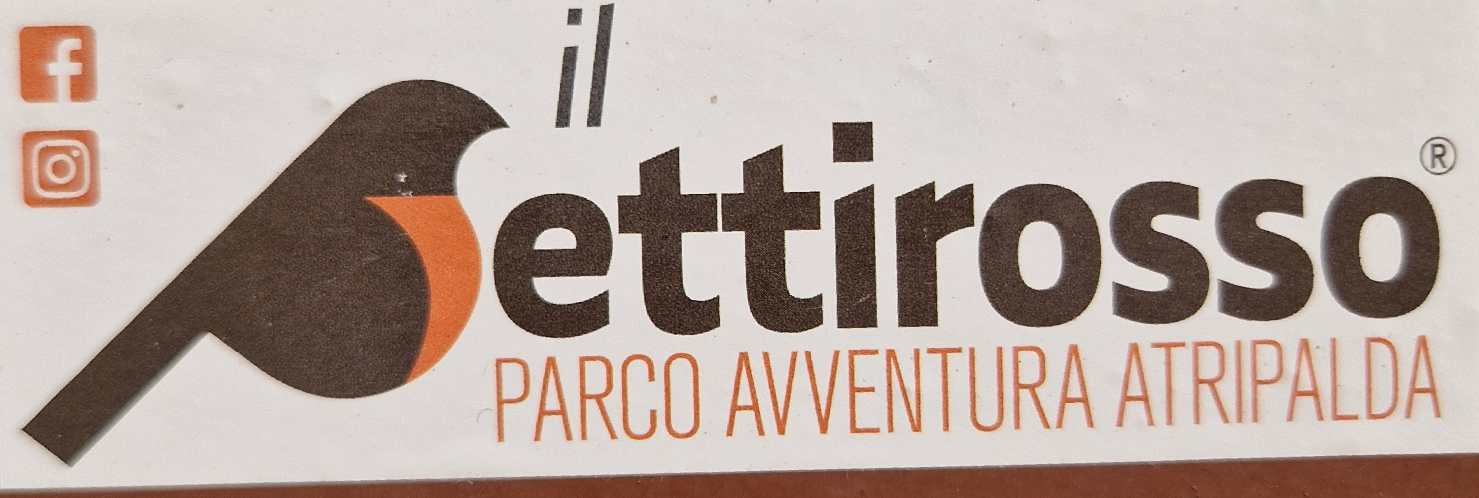 This sticker is for "il Pettirosso Parco Avventura Atripalda" featuring a bird graphic and social media icons. The bird is designed in a simplistic, modern style, and the text below it indicates the name of the park. The presence of Facebook and Instagram icons suggests that the park has a presence on these social media platforms.