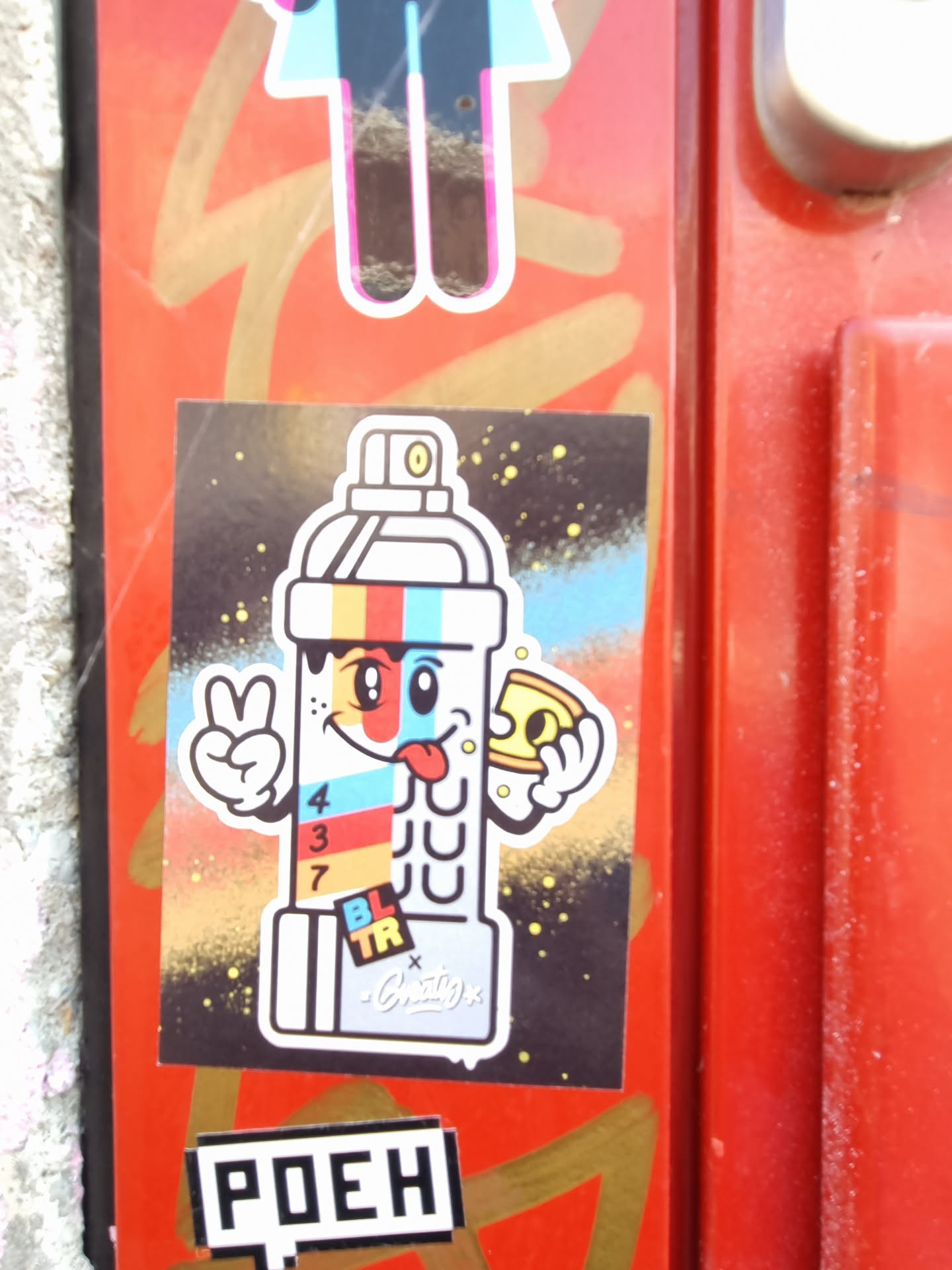 A sticker of a cartoon spray can character holding a slice of pizza. The character is multi-colored and has a peace sign and tongue sticking out. The background is black with yellow and blue accents. There is text on the sticker that says "4 3 7 BL TR" and a signature.