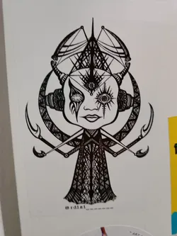 A black and white sticker featuring detailed line art of a creature with horns, intricate patterns, and a third eye. The style is dark and mystical, with a focus on geometric shapes and symbolic imagery. The artist's Instagram handle is visible at the bottom.