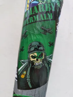 A green sticker featuring a skull wearing a pilot's helmet and goggles.  Airplanes are depicted in the background. The top of the sticker shows some text that looks like "MARRY DERMALM".
