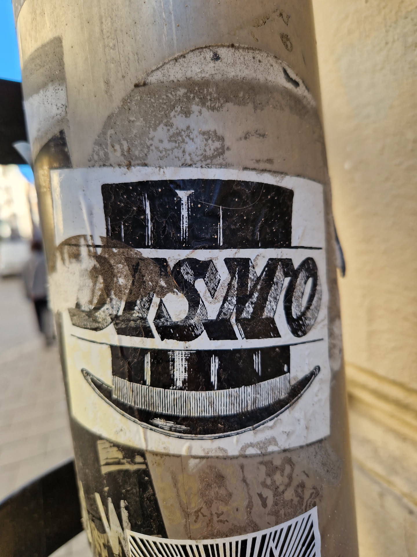 A sticker featuring the word JASVO stylized in a top hat. The design is black and white with a vintage feel.