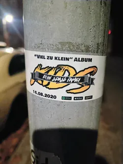 Sticker promoting the album "Viel Zu Klein" by the music group Kein Spaß Family.  The sticker features their logo and release date (16.08.2020).  Links to Spotify, Apple Music, and Amazon Music are included.