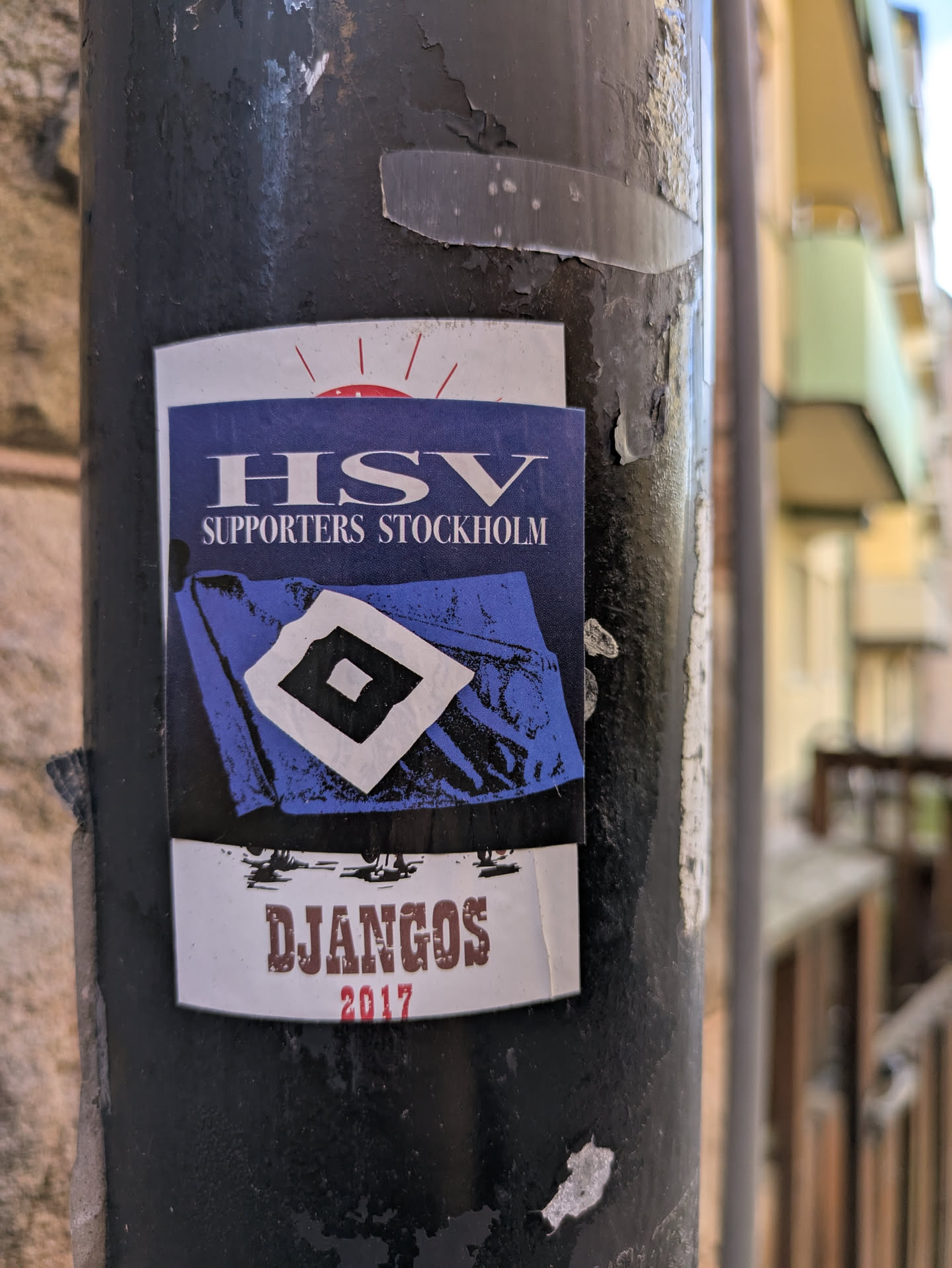 The sticker features a blue background with the text "HSV Supporters Stockholm" at the top. Below the text is an image of the HSV Hamburg crest. At the bottom, the text "Djangos 2017" is visible.