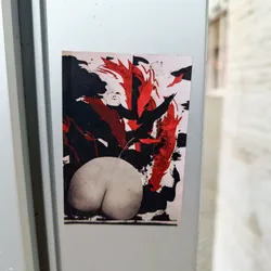 A sticker featuring an abstract artwork dominated by red and black brushstrokes. A light-colored pear is prominently positioned in the center, partially obscured by the abstract elements.  The style is reminiscent of expressionism or abstract expressionism.