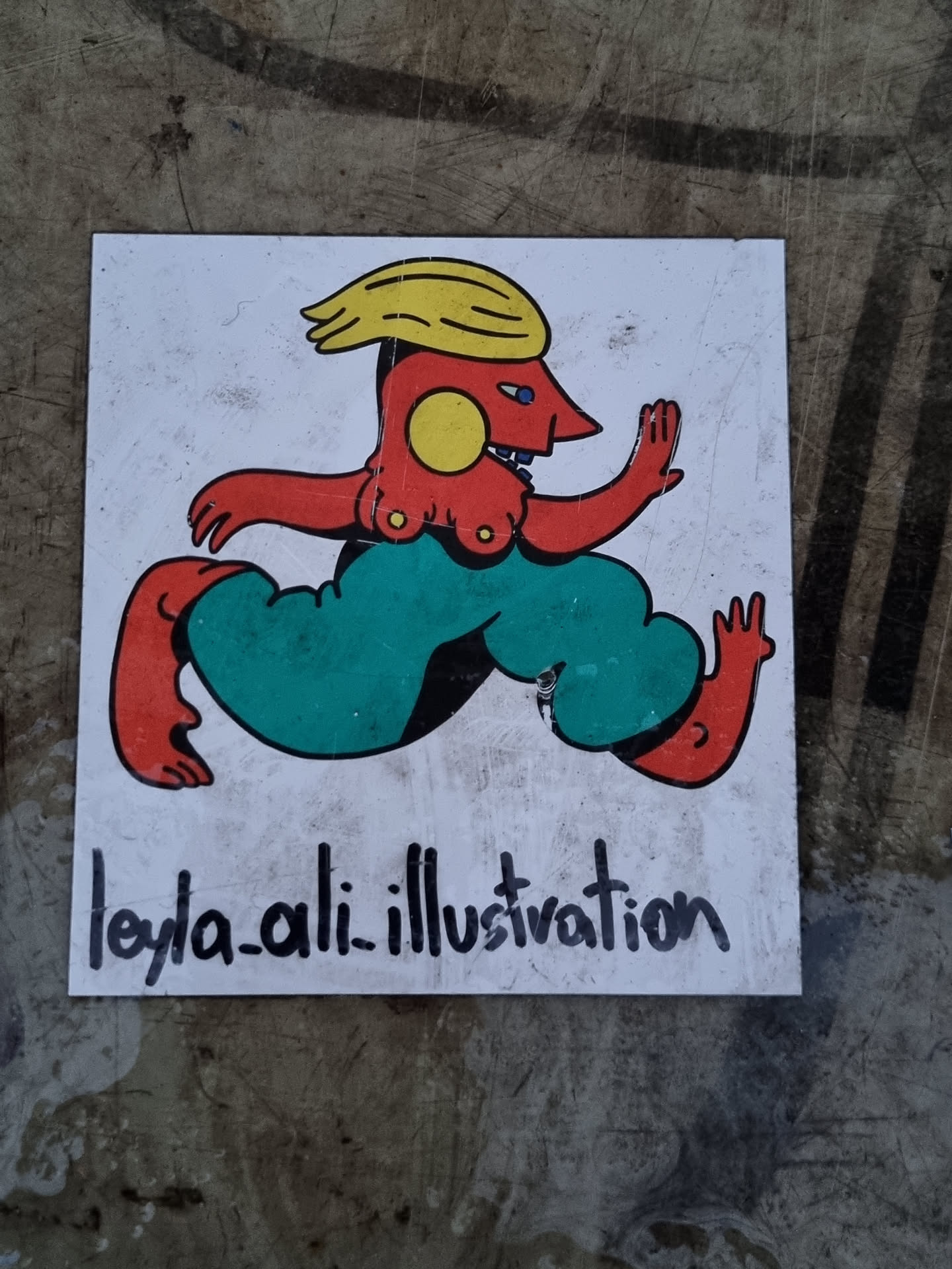 This sticker features a unique illustration of a stylized figure in motion, with bold colors and a distinct artistic style. The artist's signature, "leyla_ali_illustration," is visible at the bottom.