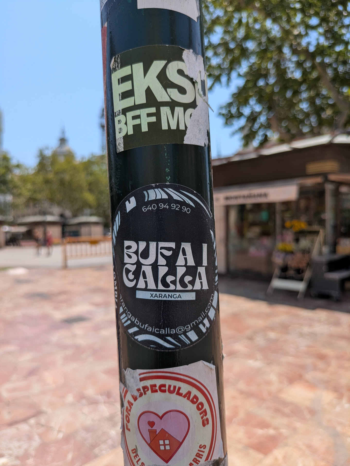 The sticker is black and white with the text 'BUFAI CAICA XARANGA' displayed prominently. It also includes a phone number, 640 94 92 90, and an email address: rangabufaicalla@gmail.com. Xaranga is a type of festive musical band.
