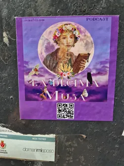 Purple sticker featuring an illustration of a woman with a flower crown writing in a book under a large moon.  There is also a QR code, a bat, a black cat, and butterflies in the illustration. The text on the sticker includes the title "La Decima Musa",  "PODCAST" in the upper right corner and a website address at the top: comafili.com