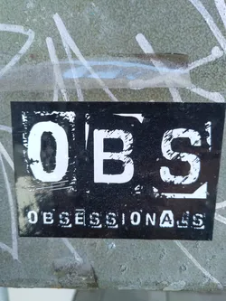 Black and white sticker with the word OBSESSIONALS. The word OBS is in a larger, bolder font.