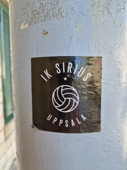 A black and white sticker featuring the logo of IK Sirius Uppsala, a volleyball club from Uppsala, Sweden. The logo includes the club's name, a stylized volleyball, and the city name.