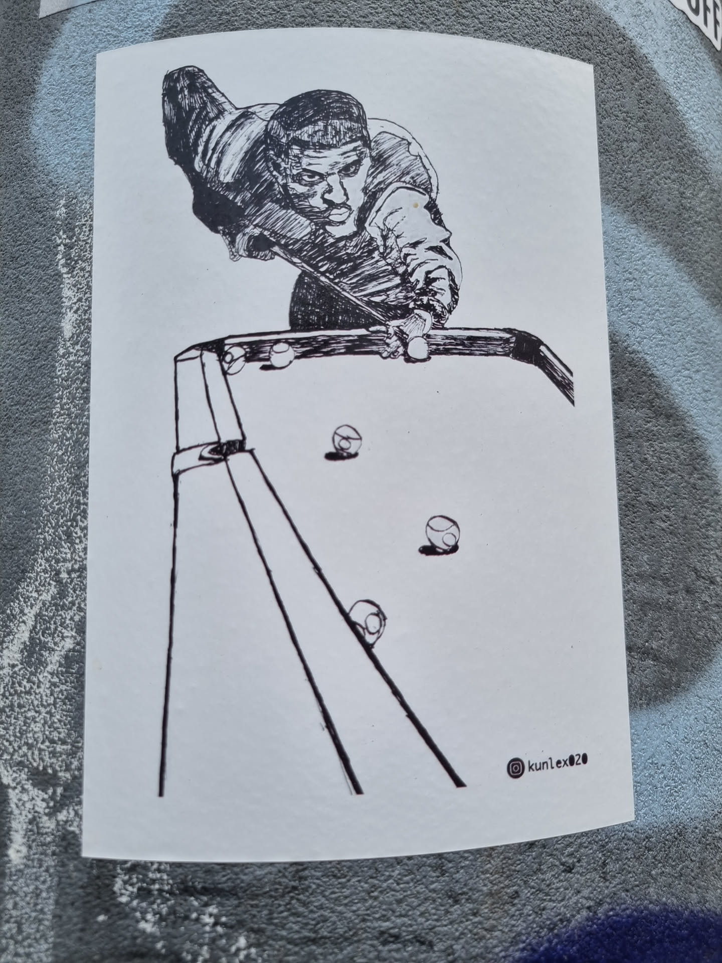 This sticker features a black and white illustration of a person playing billiards, focusing on the player's concentrated stance and the strategic positioning of the balls.  The artist's signature, "kun1exd," is visible in the bottom right corner. 