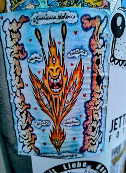 A vibrant sticker featuring a cartoonish flaming creature with three eyes and a joyful expression.  The design includes the words "electric", "kaktong", "flashes", and "customs" in cloud-like shapes surrounding the main figure.  The artist's Instagram handle is visible at the top. The sticker also states that it is part of the "Simple Tattoo Club".