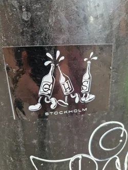 A sticker featuring three anthropomorphic bottles walking, with the word "STOCKHOLM" written below. The bottles appear to be pouring liquid.