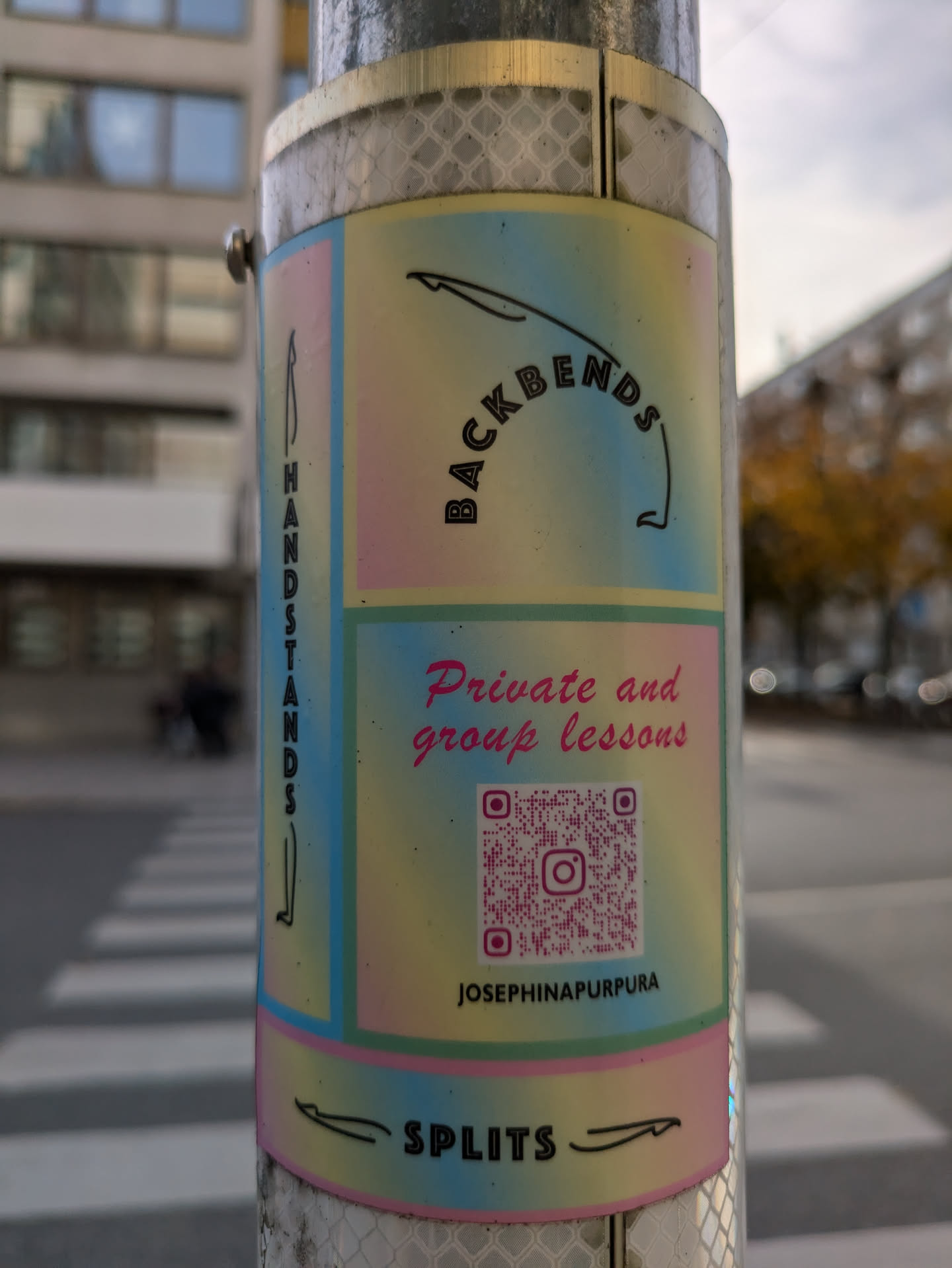 Sticker promoting yoga classes focusing on backbends, handstands and splits.  The sticker has a pastel color scheme and includes a QR code linking to the instructor's Instagram profile.