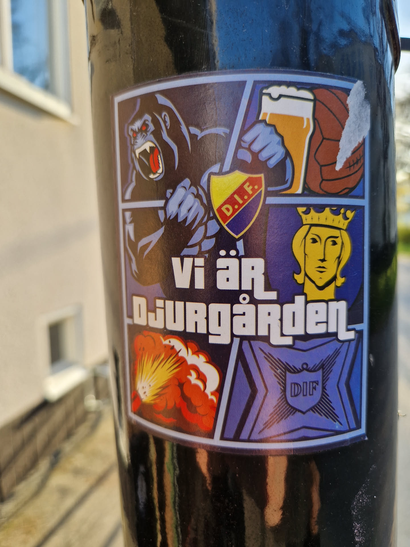 A sticker showing various images related to Djurgården, including a gorilla, a beer, a soccer ball, a shield with the initials "D.I.F.", a crowned figure, and an explosion. The text "Vi är Djurgården" is prominently displayed, which translates to "We are Djurgården" in English.