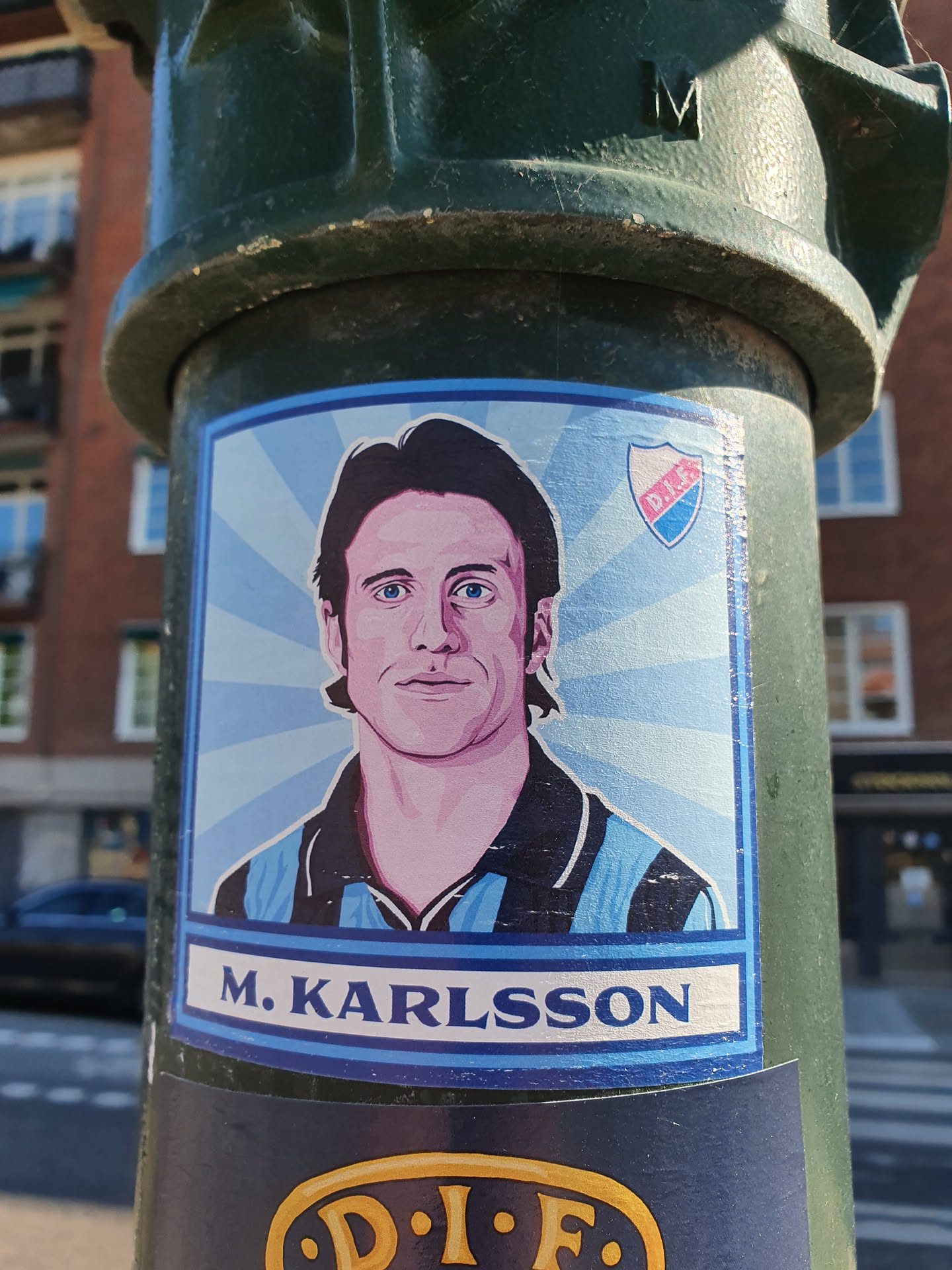 A sticker featuring a portrait of M. Karlsson, possibly a football player, with the DIEF logo. The style is reminiscent of retro sports trading cards.