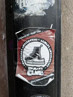 Sticker from No Man's Club with an illustration of boots and the text Sometimes Antisocial Always Antifascist. The sticker includes a link to the club's Linktree profile.