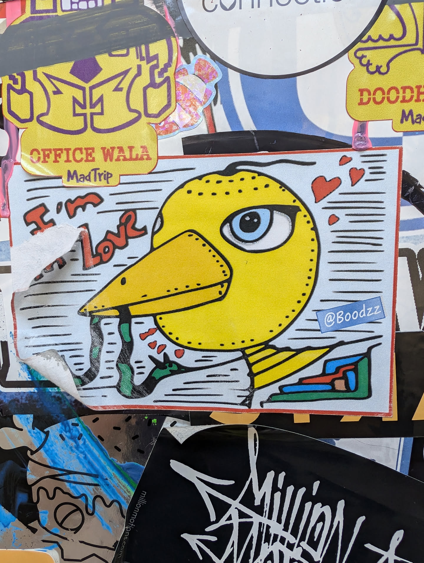 Yellow bird sticker with hearts and the text "I'm Love".  The artist's Instagram handle is included (@Boodzz).