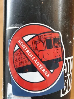 A sticker with a red circle and a diagonal line across a train image. The text "KONTROLLANTERNA" is written on the diagonal line. The sticker seems to protest against Kontrollanterna.