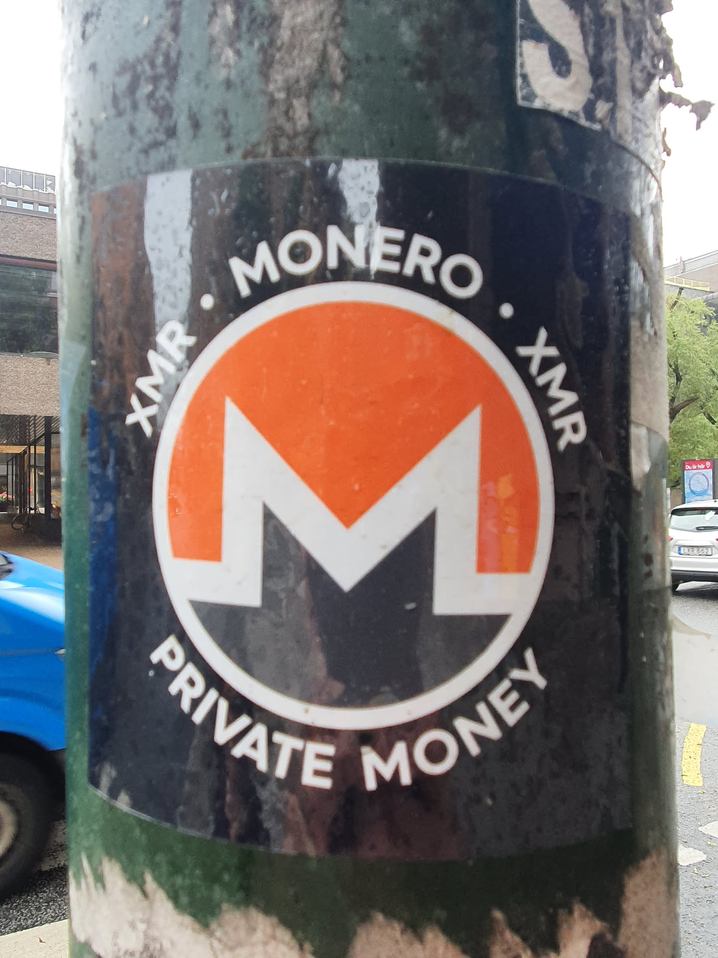 A sticker featuring the Monero logo and the text "Monero. XMR. XMR. Private Money".