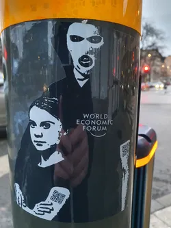 Sticker featuring Greta Thunberg and Guy Fawkes with the text 'World Economic Forum'.  Two QR codes are present on the sticker. The sticker appears to be a form of political commentary or protest.