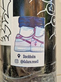 A sticker featuring a stylized illustration of a pair of pink and white Nike sneakers. The sticker also includes location information indicating Stockholm and an Instagram handle: @dalaro.resell.
