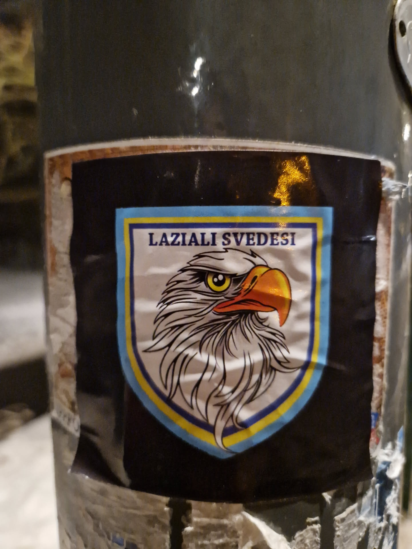 A black sticker featuring a shield with an eagle and the text "Laziali Svedesi".