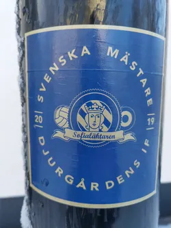 A blue sticker celebrating Djurgårdens IF's win as Swedish champions in the 2019-2020 season.  The sticker features the team's logo, the years of the championship, and the words "Svenska Mästare" (Swedish Champions).