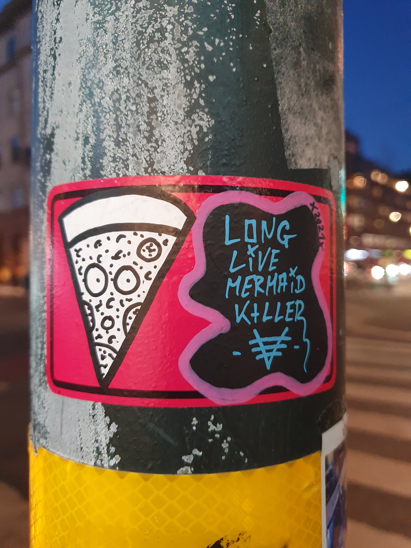 A sticker featuring a pizza slice graphic and the text 'Long Live Mermaid Killer'. The sticker is pink and black with white outlines.