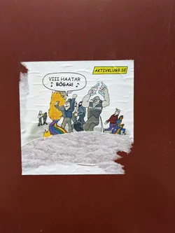 The sticker displays a cartoon illustration on a white background, showing a group of male figures engaged in a scene of hostility towards the LGBTQ+ community. In the center, a rainbow-colored flag is depicted burning, with yellow and orange flames. One prominent figure, a man with a beard and blue jacket, raises his fist and holds a smartphone, seemingly taking a selfie in front of the burning flag. To his right, a large, muscular man in a grey tank top (with 'AKTIV KLUBB' visible) is tearing apart a white object above his head. Other figures are in the background, observing or participating. On the right side of the illustration, two figures are shown running away, one wearing a rainbow-striped hat and the other with rainbow-colored pants. A speech bubble in the top left corner contains the text 'VIII HAATAR ♪ BÖGAR! ♪'. In the top right corner, a yellow banner with a black border reads 'AKTIVKLUBB.SE'. The sticker itself is visibly creased, wrinkled, and torn, particularly along the bottom edge, indicating it is a physical item affixed to a surface.