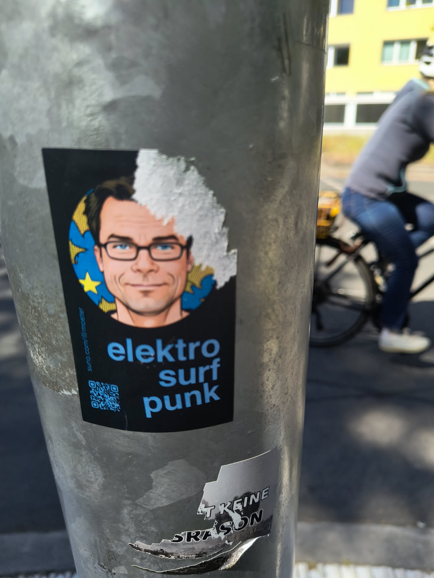 The sticker features a portrait of Martin Sonneborn, a German politician, with a background of EU stars. Below the portrait, the text "elektro surf punk" is written in blue. A QR code can be seen at the bottom left.